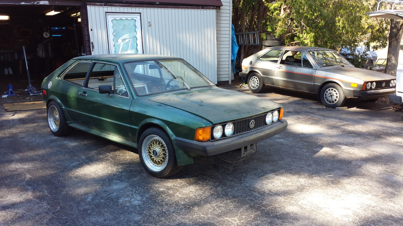 Beacock’s green car next to another Scirocco.